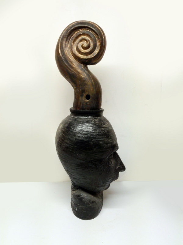 escultura cabeza terracota 78x25x30 1u